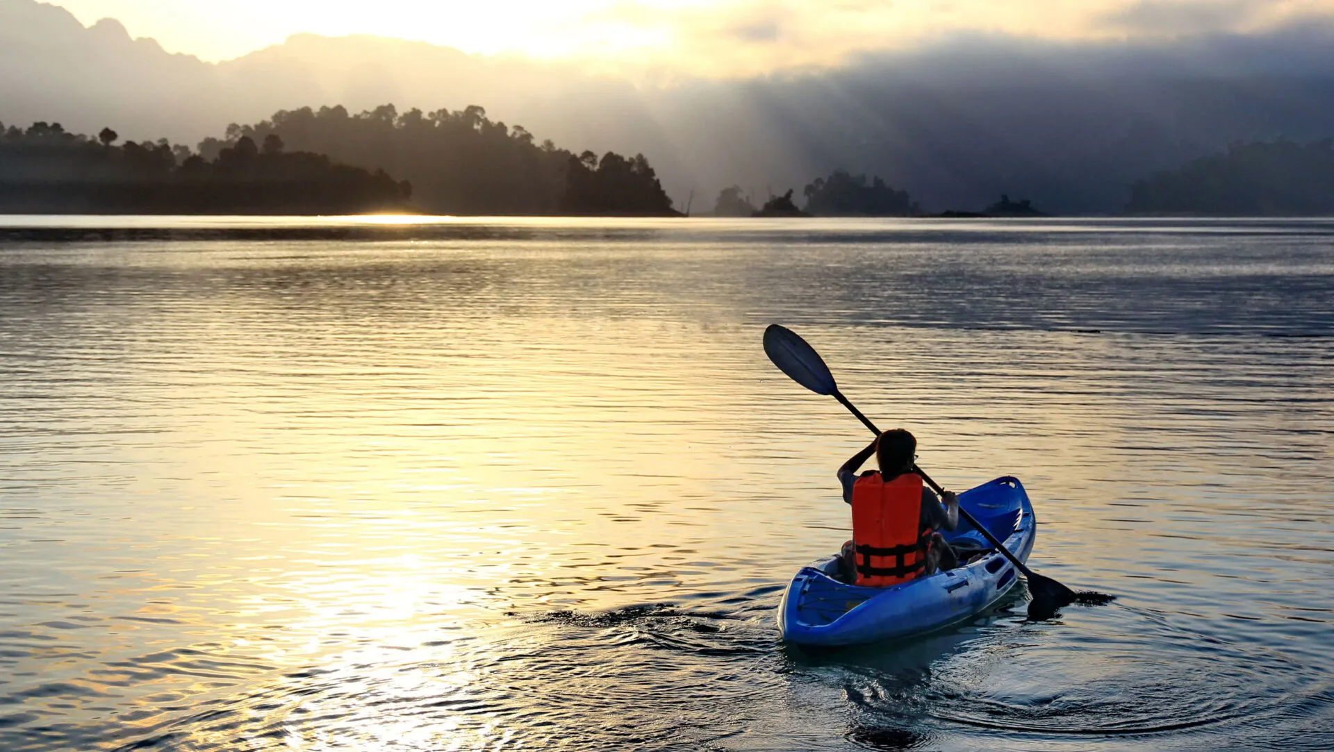 image of person kayaking, a connecticut outdoor activity.