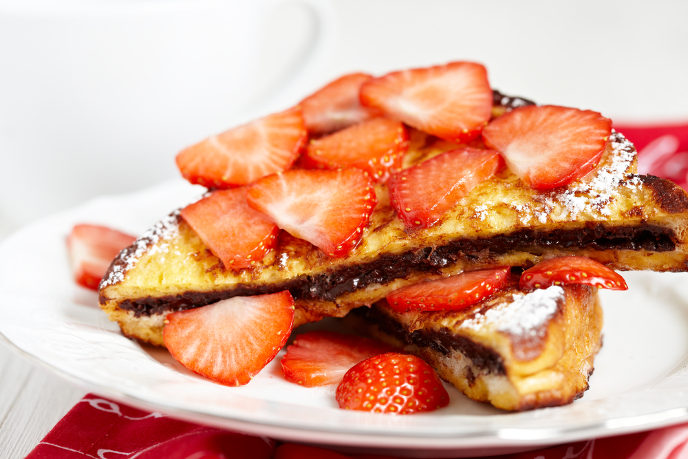 image of chocolate french toast with strawberries.