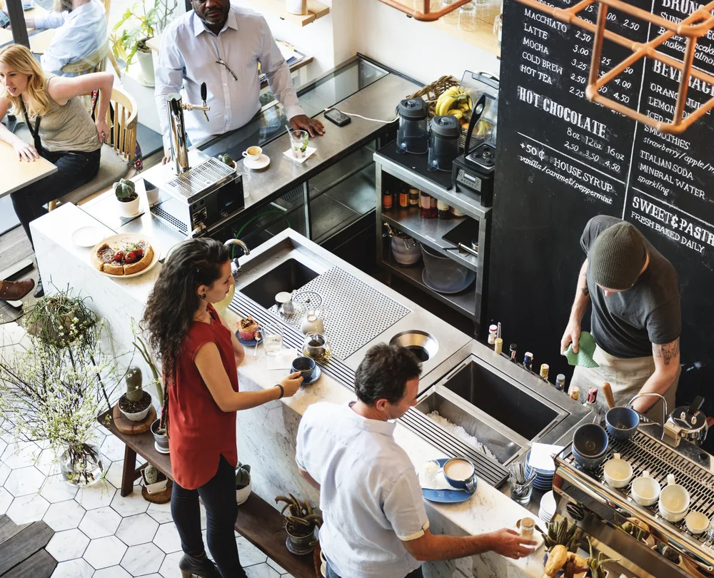 image of places for coffee in new haven. people at coffee shop counter.