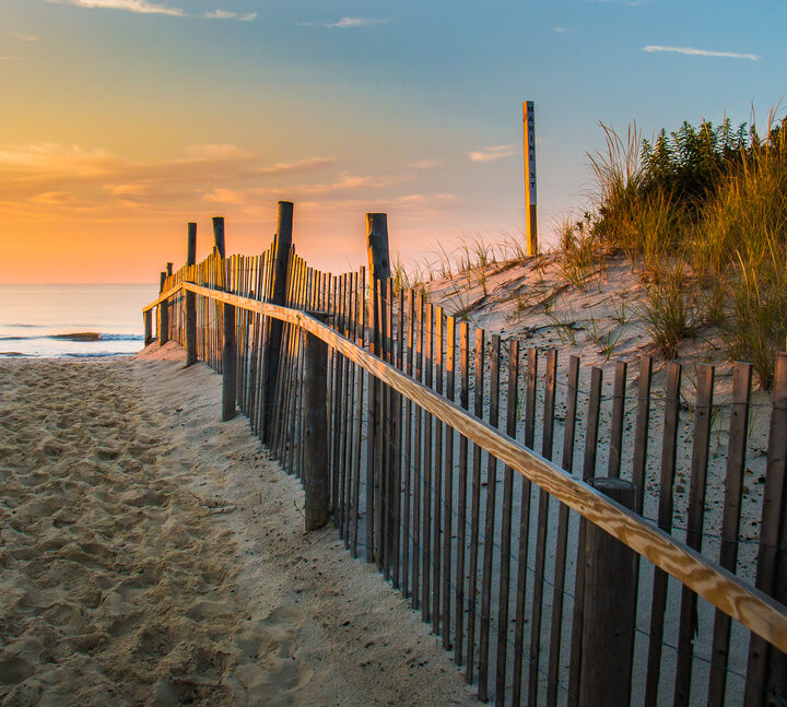 image of sand and fence at new haven beaches.