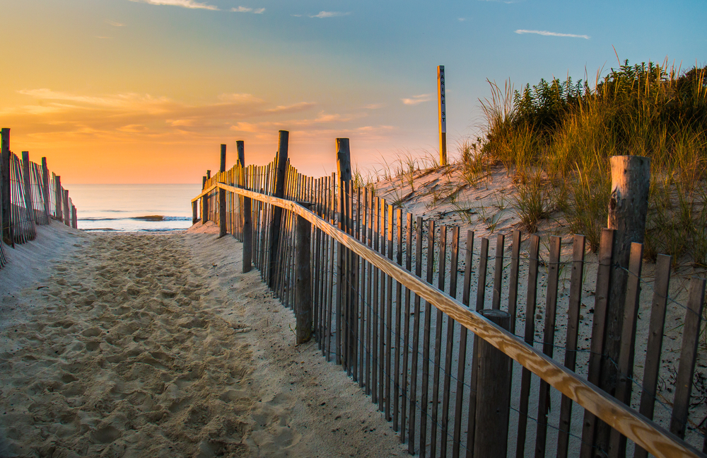 image of sand and fence at new haven beaches.