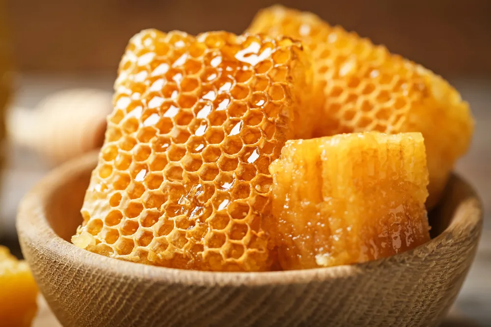 Image of bowl full of honeycomb in CT where you can buy local honey.