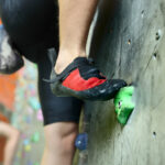 image of foot on climbing grip at an indoor rock climbing place in ct.