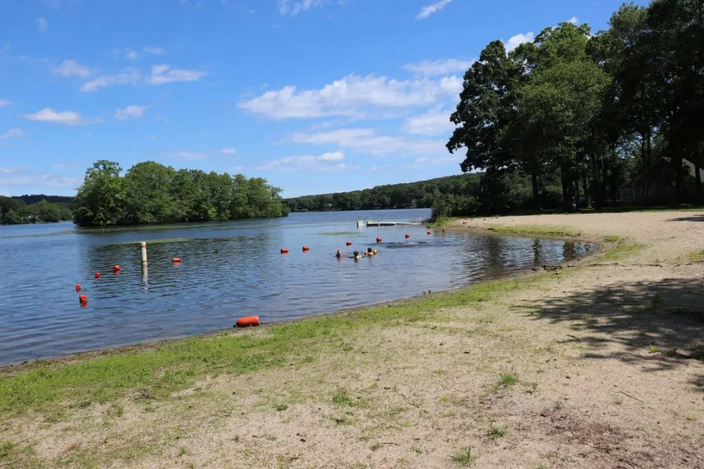 Image of public swimming beach in Haines Park at Rogers Lake in Old Lyme CT.