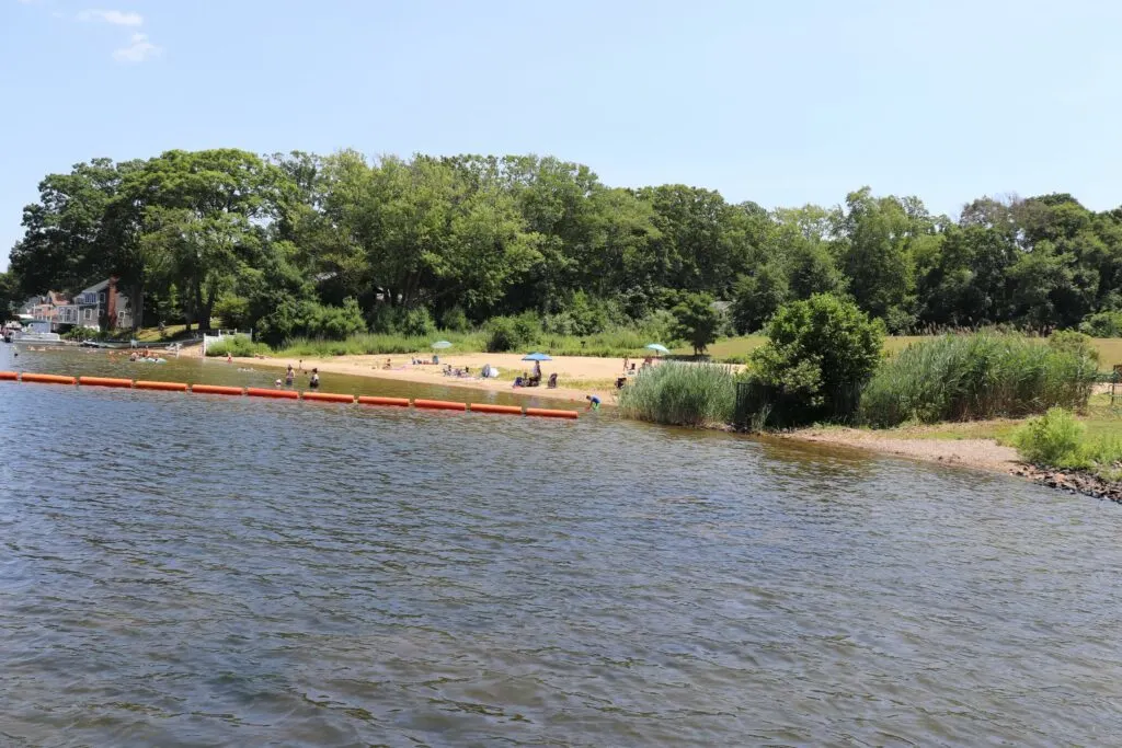 image of swimming beach at gardner lake in salem ct.