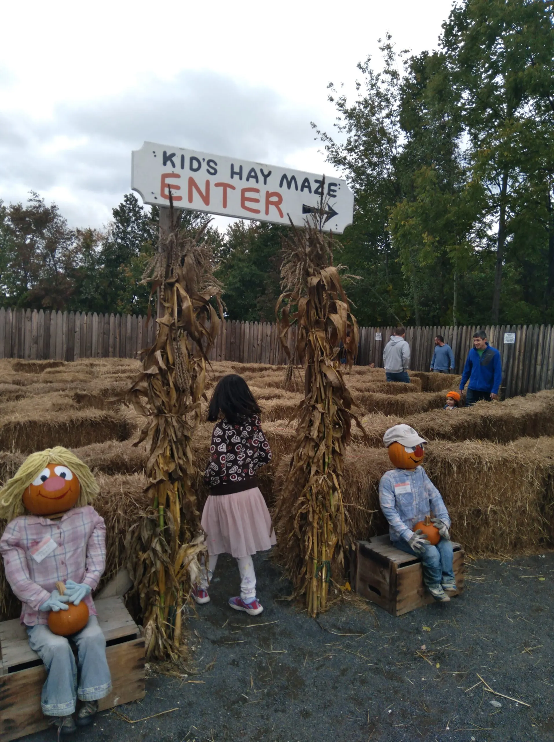 Image of child walking through hay maze at Pumpkintown usa in East Hampton CT.