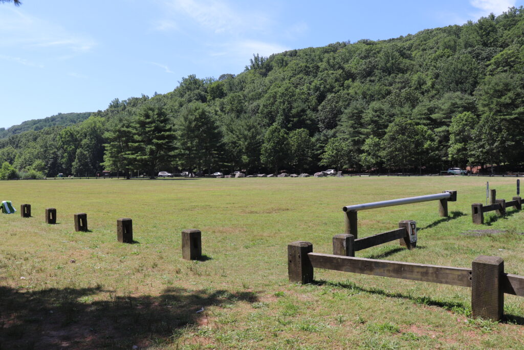 Image of grassy field near the beach in Indian Well State Park in Shelton, CT.