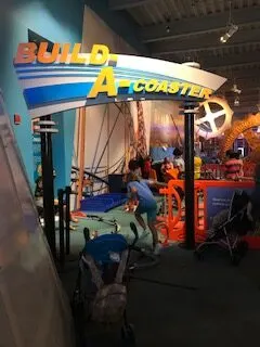 image of a roller coaster building station at the connecticut science center.