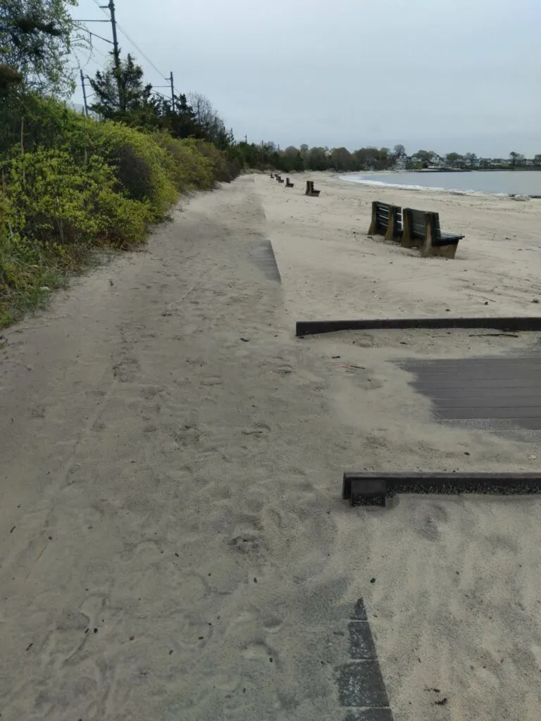 image of sand covered boardwalk at Rocky Neck State Park in East Lyme, CT.